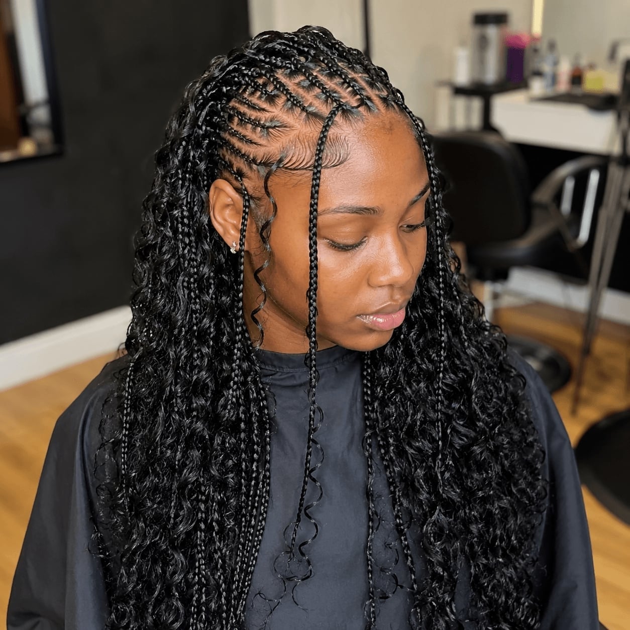 Mid-Back Fulani Braids with Geometric Pattern and Wavy Ends Mid-Back Fulani Braids with Geometric Pattern and Wavy Ends
