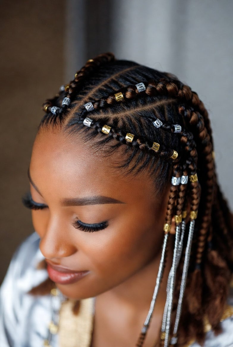 Mid-Back Fulani Braids with Wavy Ends Mid-Back Fulani Braids with Wavy Ends
