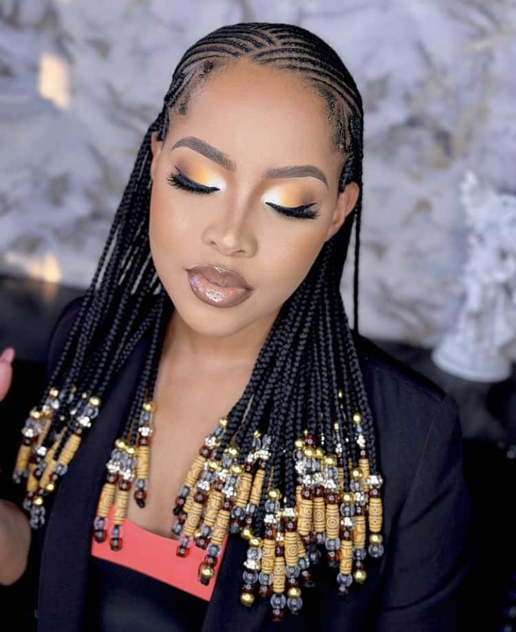Dense Mid-Back Fulani Braids with Gold and Brown Beads Dense Mid-Back Fulani Braids with Gold and Brown Beads