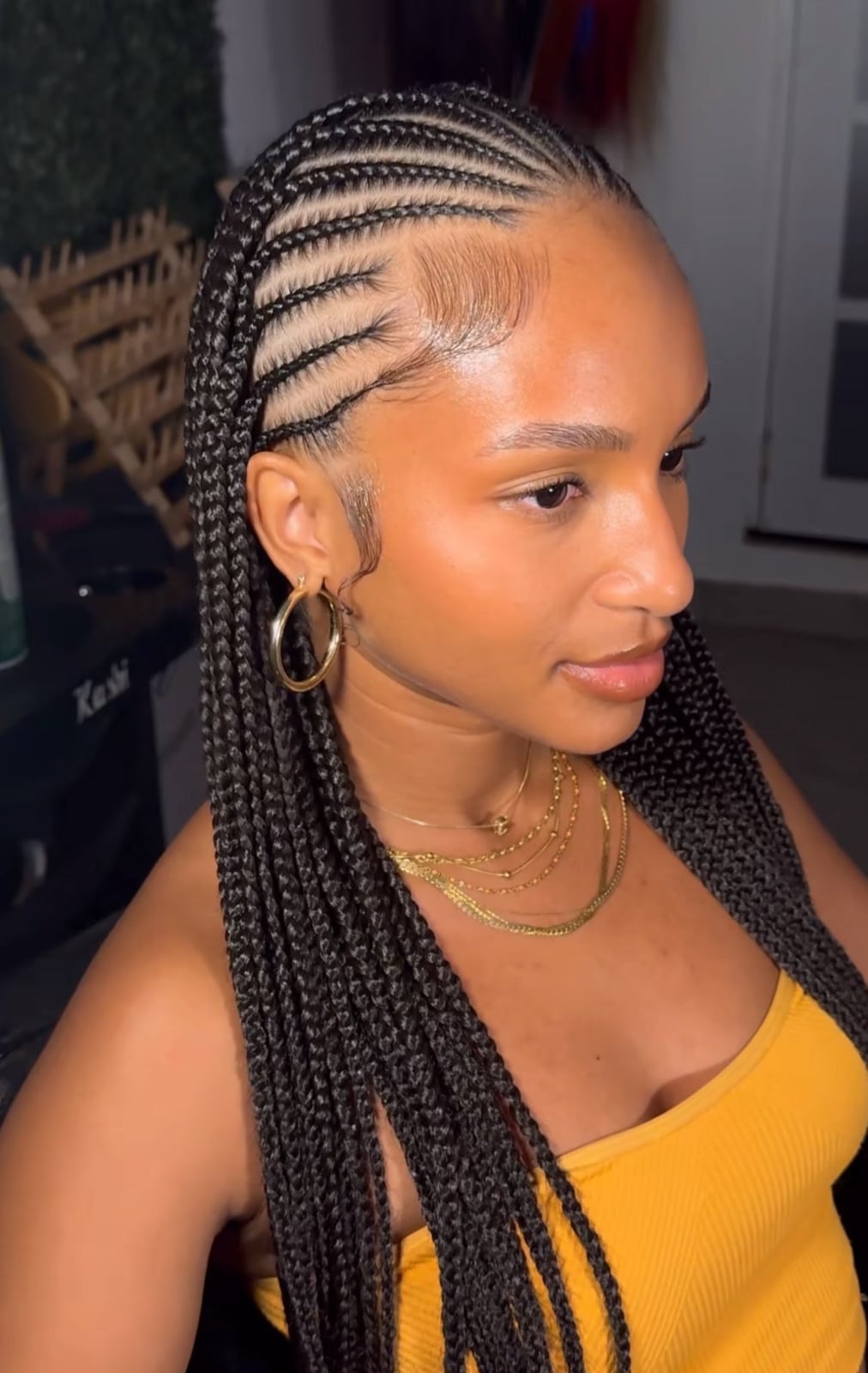Side Part Shoulder-Length Braids with Wavy Ends Side Part Shoulder-Length Braids with Wavy Ends — Fulani Braids