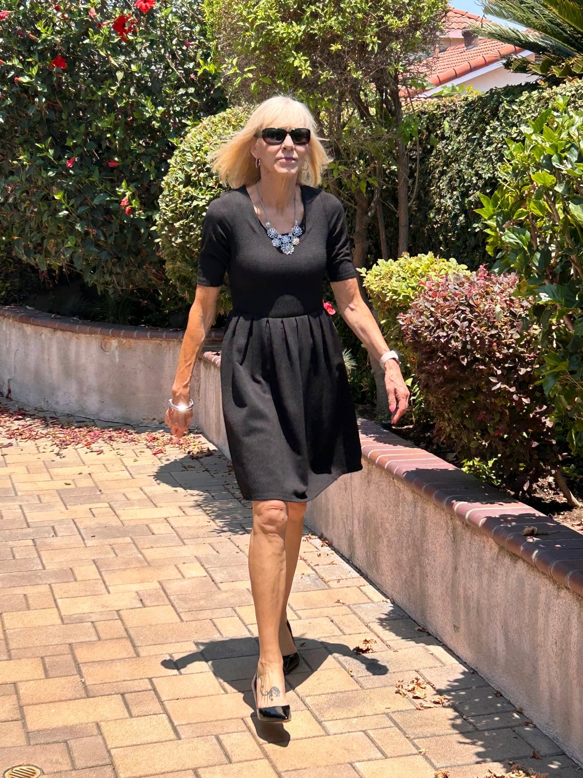 Textured Black Dress With Silver Necklace Textured Black Dress With Silver Necklace — Funeral Outfits