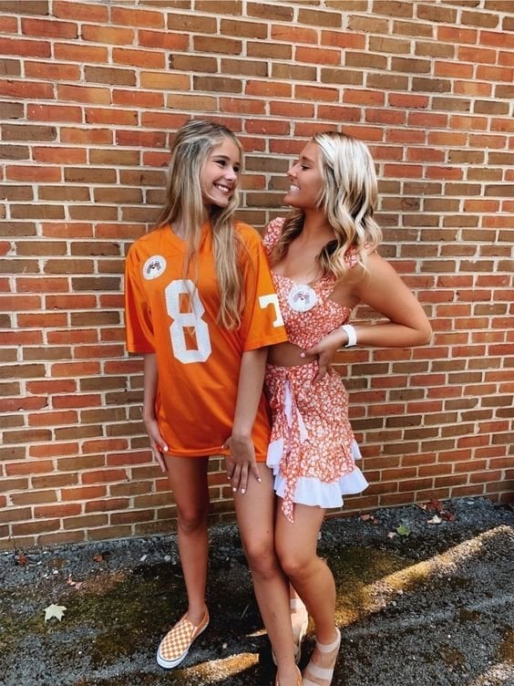 Orange Sports Jersey with Shorts and Checkered Slip-On Sneakers — Game Day Outfits