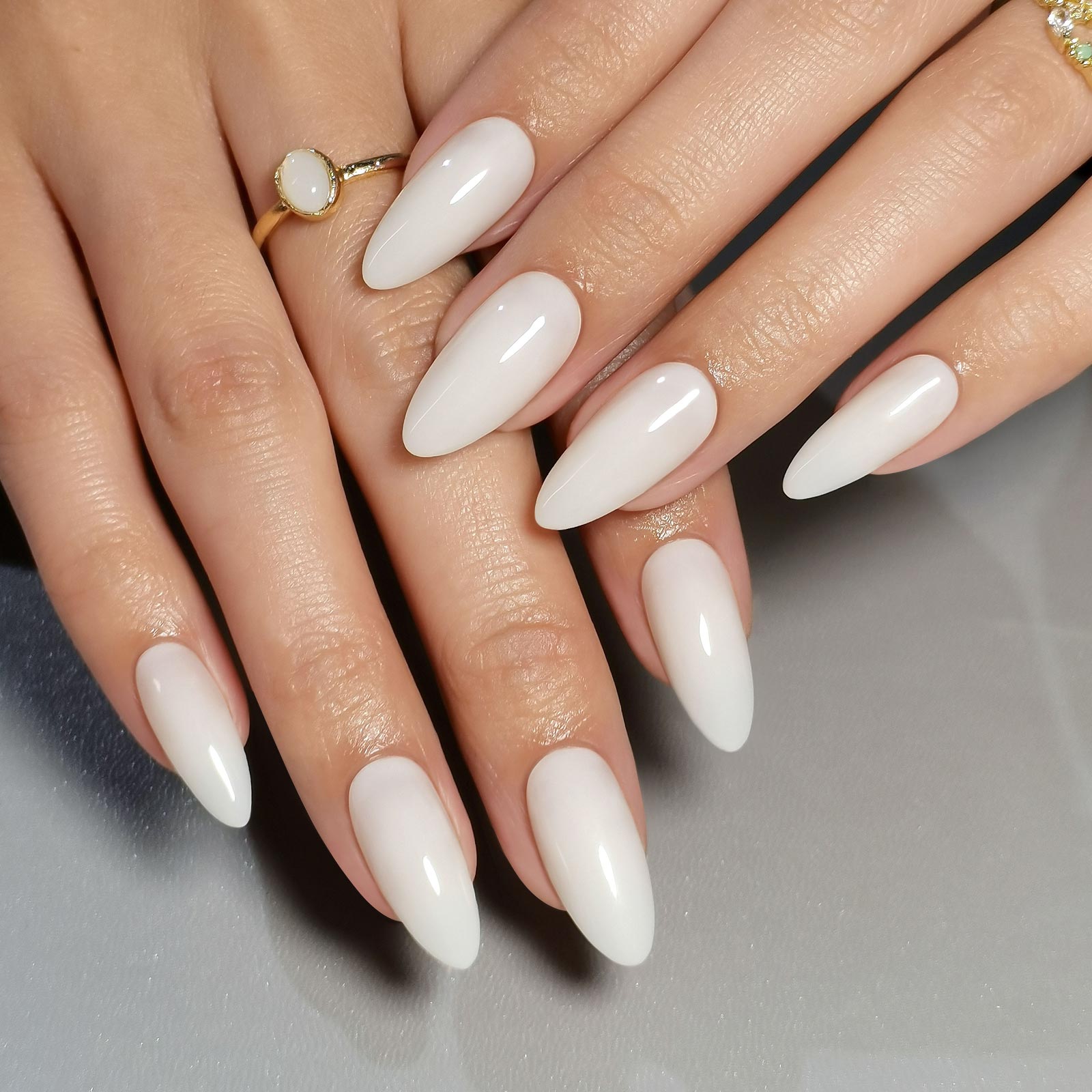Sheer Nude Glossy Short Almond Nails — Gel Nails