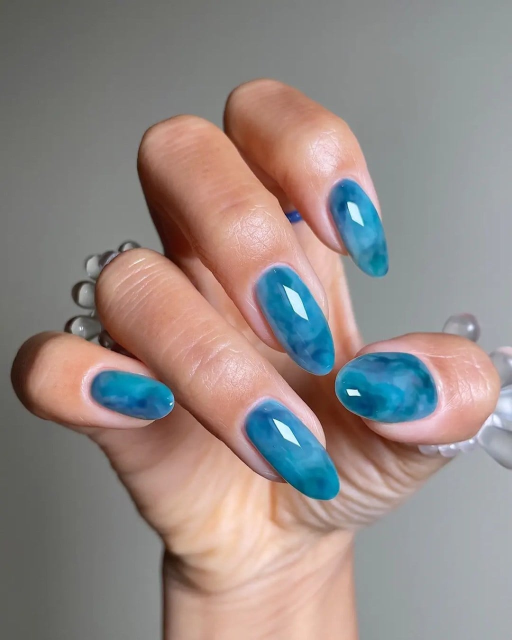 Long Oval Teal And Blue Marble Nails — Gel Nails Colors