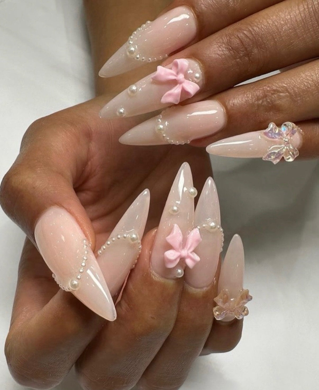 Long Stiletto with Pearls and Bows Long Stiletto with Pearls and Bows — Gel X Nails