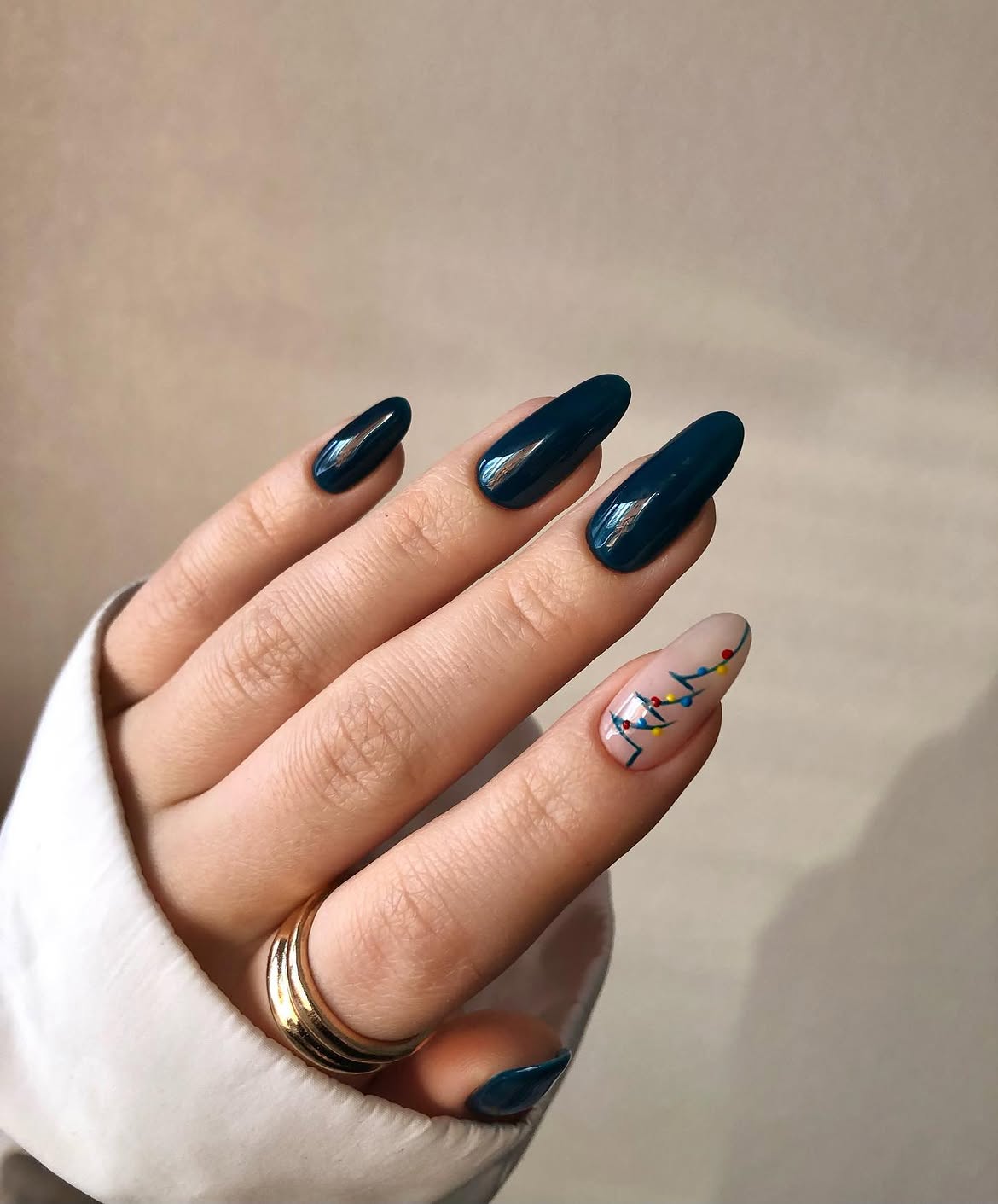 Glossy Dark Teal Christmas Lights Almond Nails
