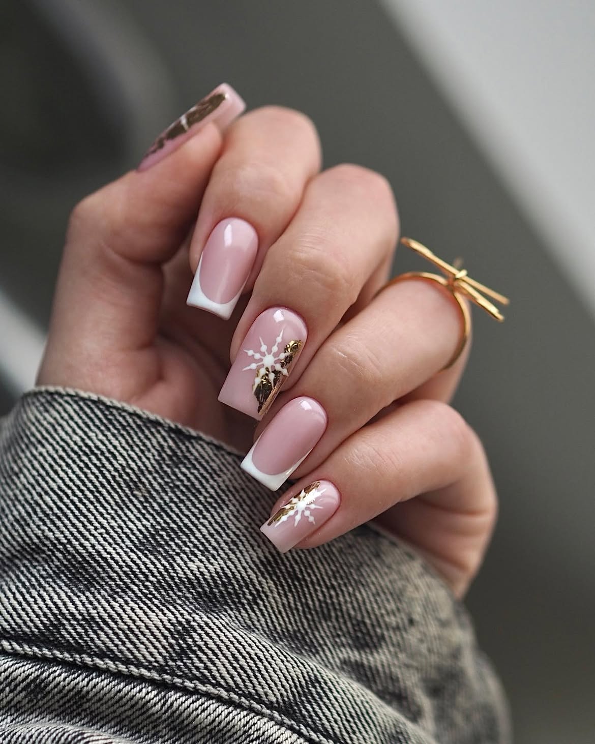 Glossy Pink French Tip Nails With Gold Snowflake Art