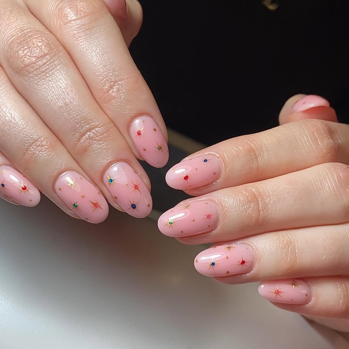 Glossy Pink Starry Night Oval Christmas Nails