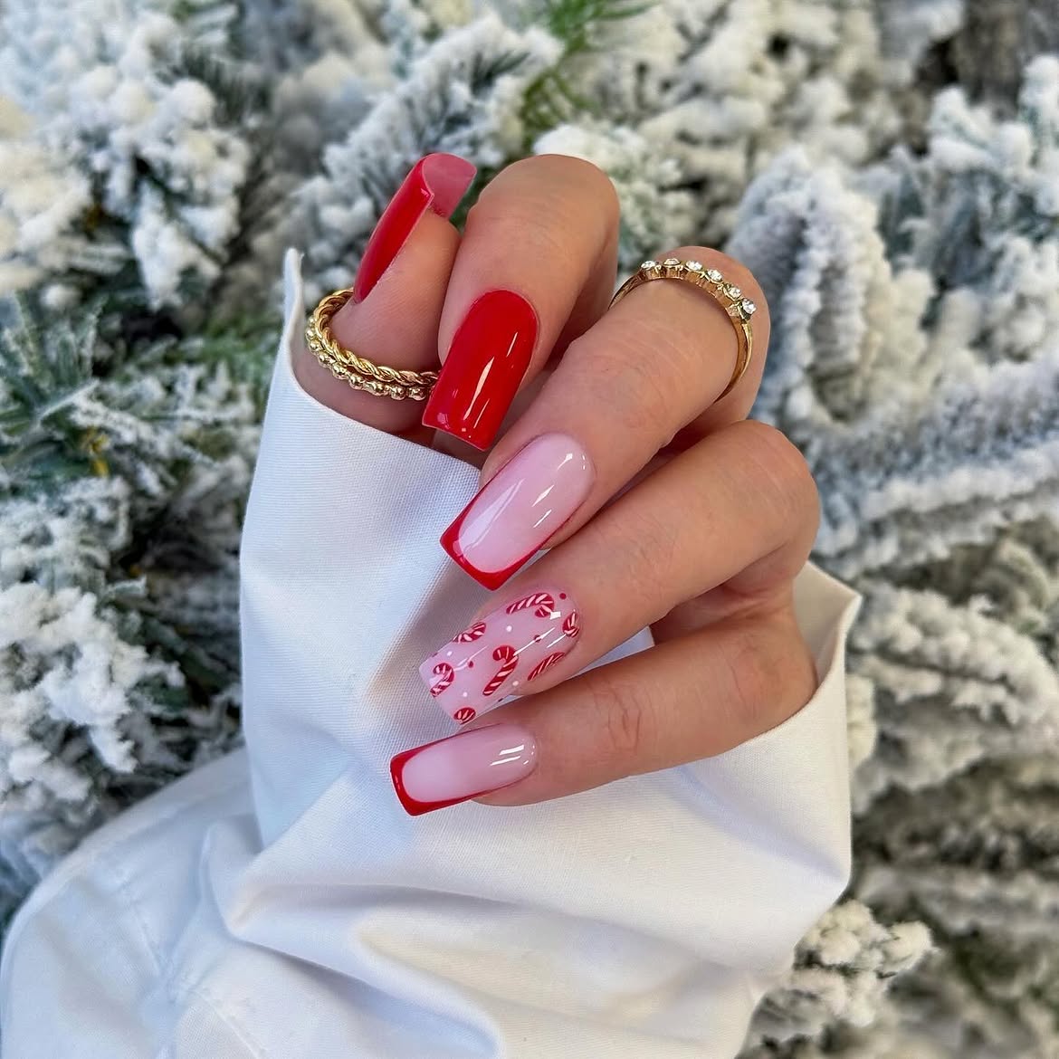 Glossy Red French Tip And Candy Cane Nail Art