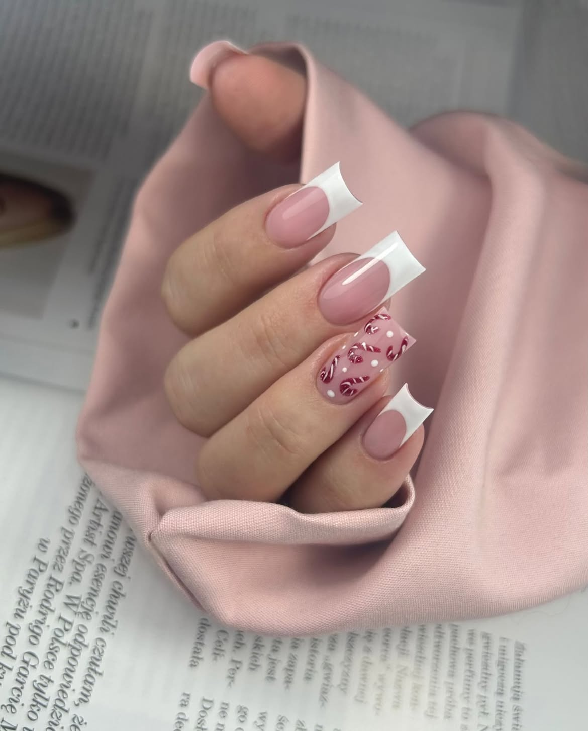 Glossy White French And Candy Cane Nail Art