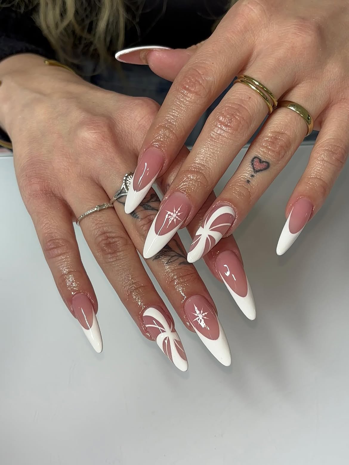 Glossy White French Tip Almond Winter Nail Art