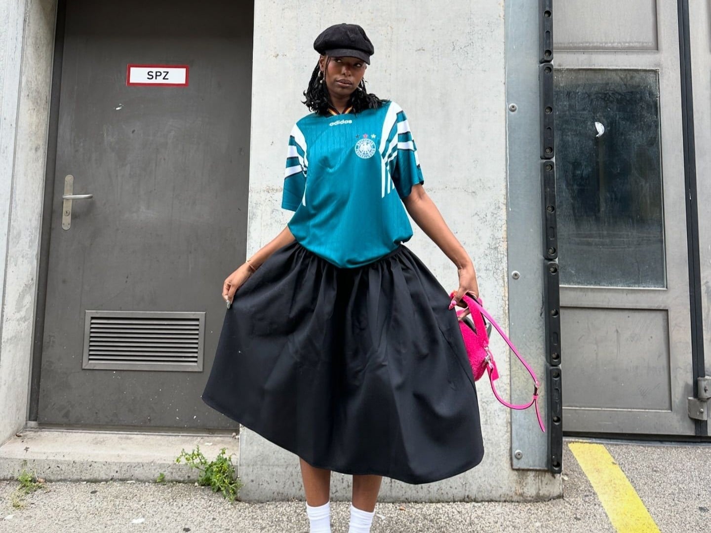Athletic Jersey Tucked into a Voluminous Black Midi Skirt Athletic Jersey Tucked into a Voluminous Black Midi Skirt — Going Out Outfits Black Women