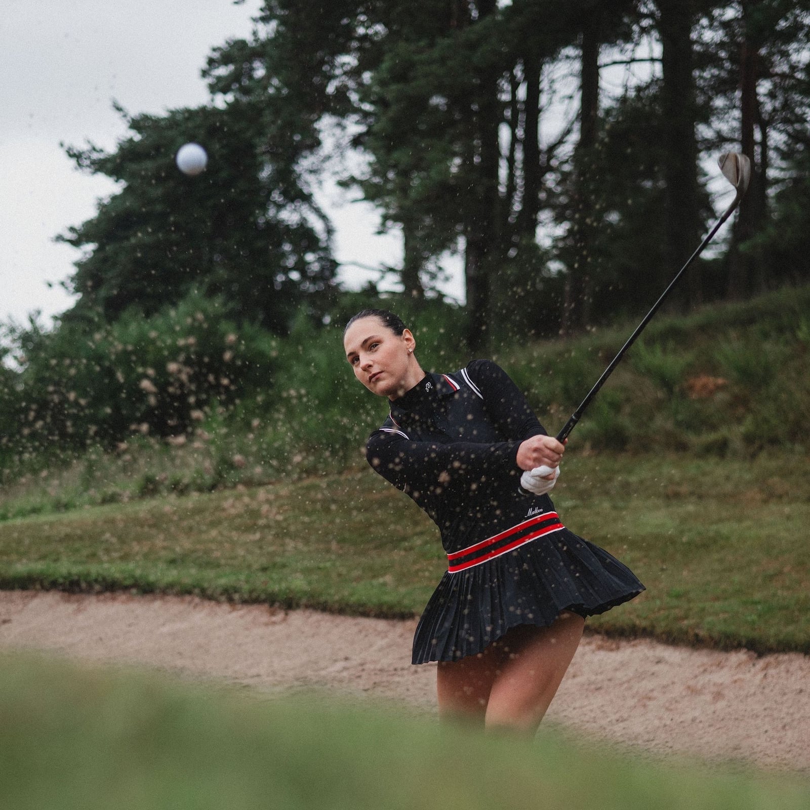 Black Long-Sleeve Top and Pleated Skirt with Trim — Golf Outfits
