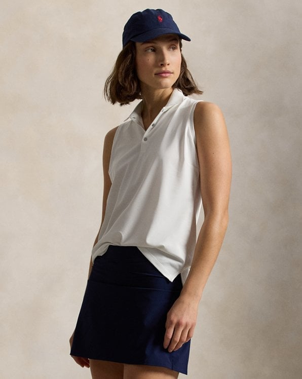 White Sleeveless Polo and Navy A-Line Skirt — Golf Outfits