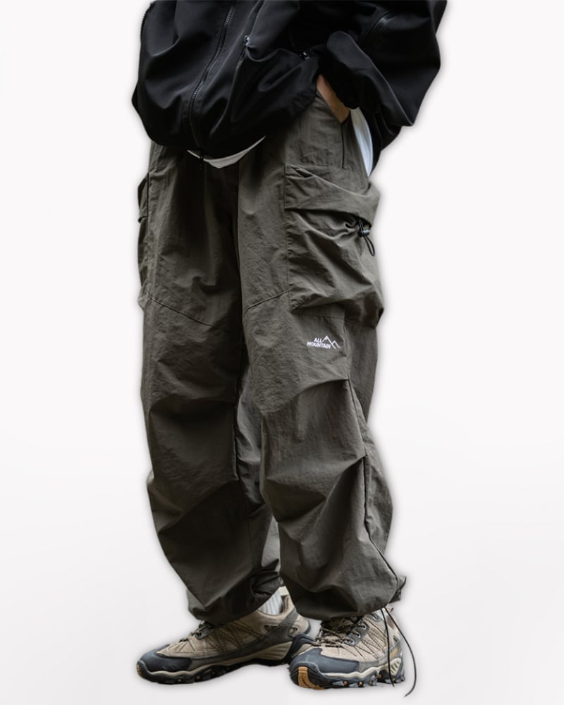 Olive Green Cargo Pants with Black Jacket and Hiking Boots — Gorpcore Outfits