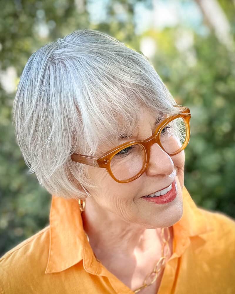 Short Layered Bob With Side Bangs Short Layered Bob With Side Bangs — Gray Hair