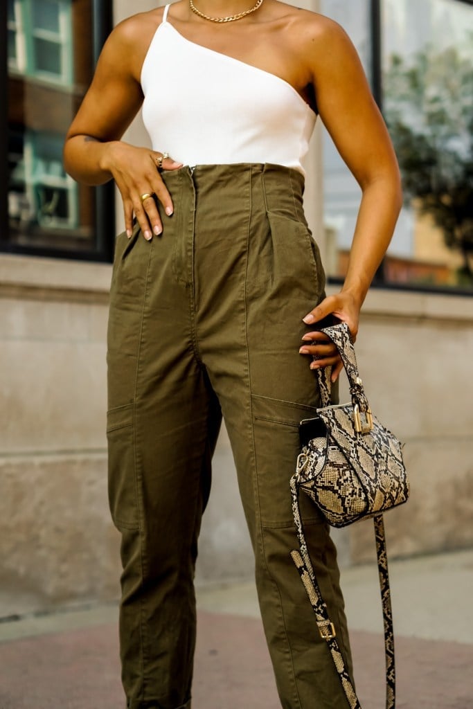 High-waisted Olive Green Cargo Pants with One-Shoulder, Close-Up Take — Green Cargo Pants Outfit