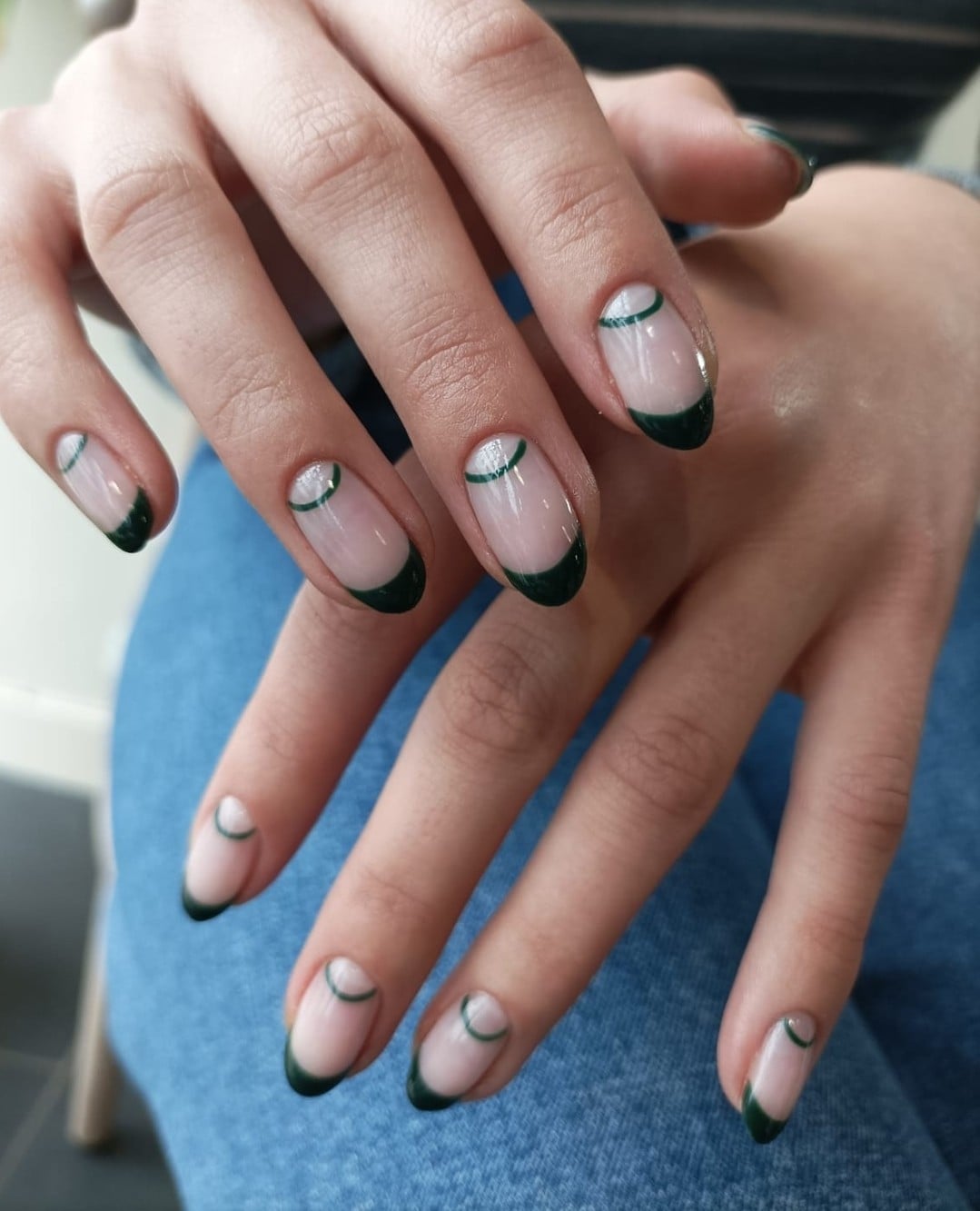 Dark Green Short Oval with Geometric Line Art — Green French Tip Nails