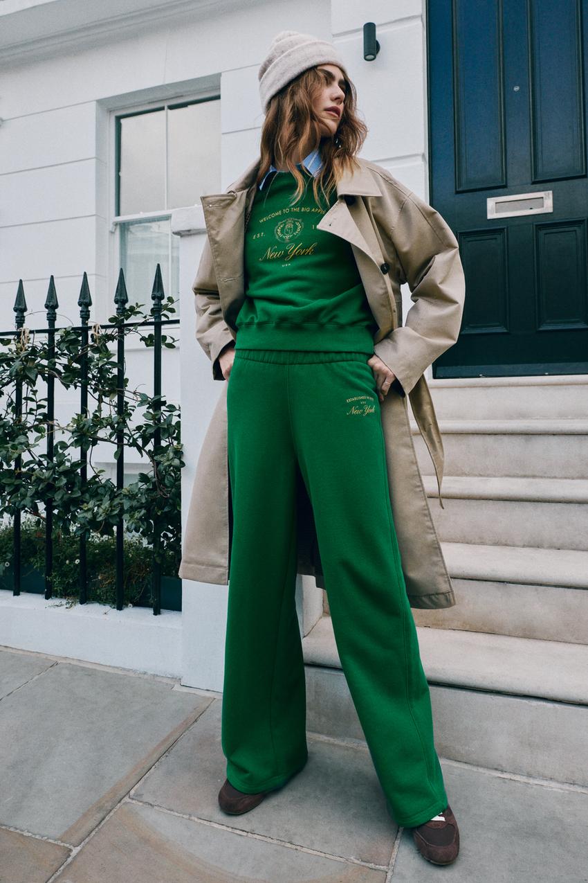 Bright Green Sweatpants with a Blue Shirt and Beige Trench Coat Bright Green Sweatpants with a Blue Shirt and Beige Trench Coat — Green Sweatpants Outfit