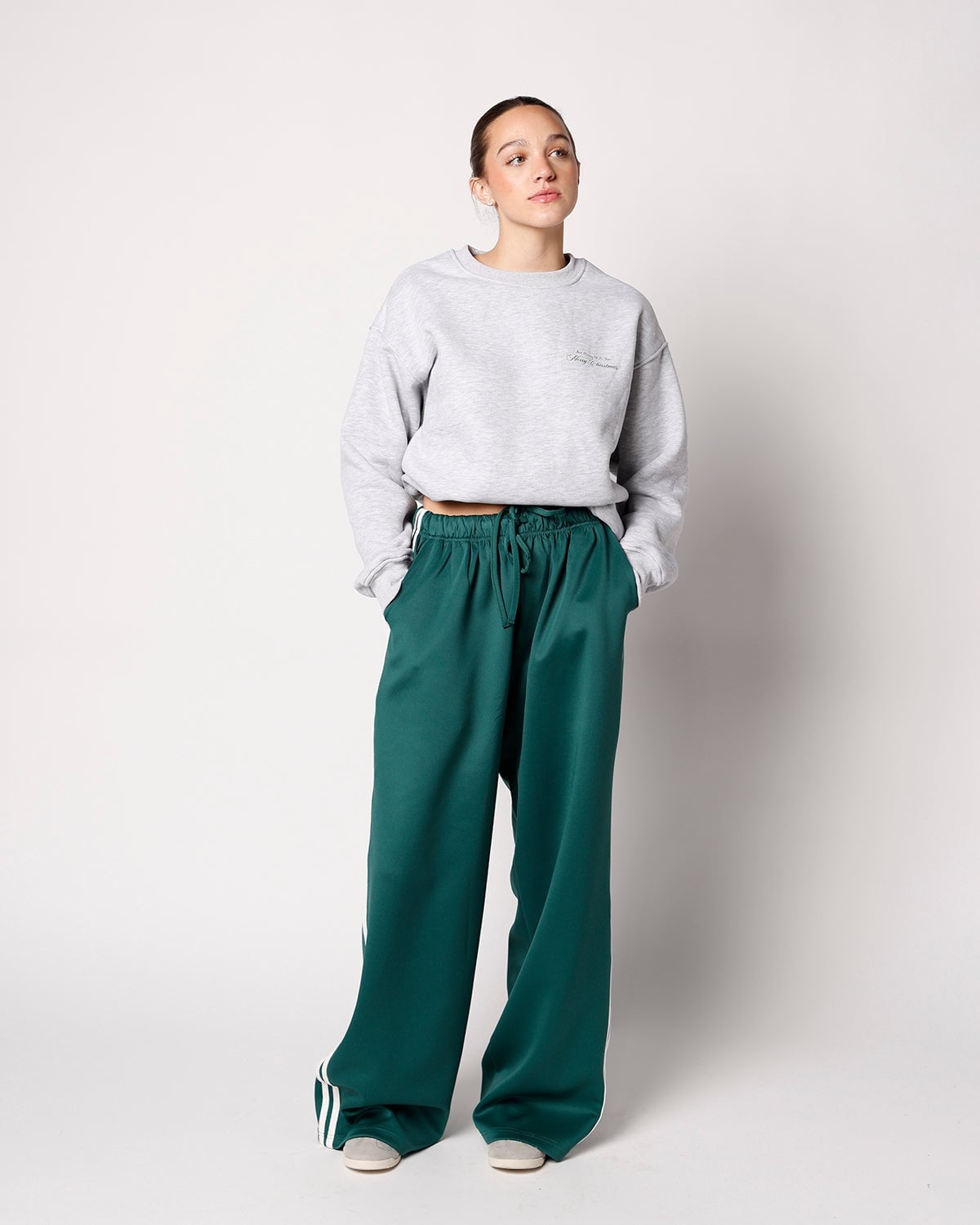 Green Wide-Leg Pants with White Side Stripes and Gray Sweatshirt Green Wide-Leg Pants with White Side Stripes and Gray Sweatshirt — Green Sweatpants Outfit