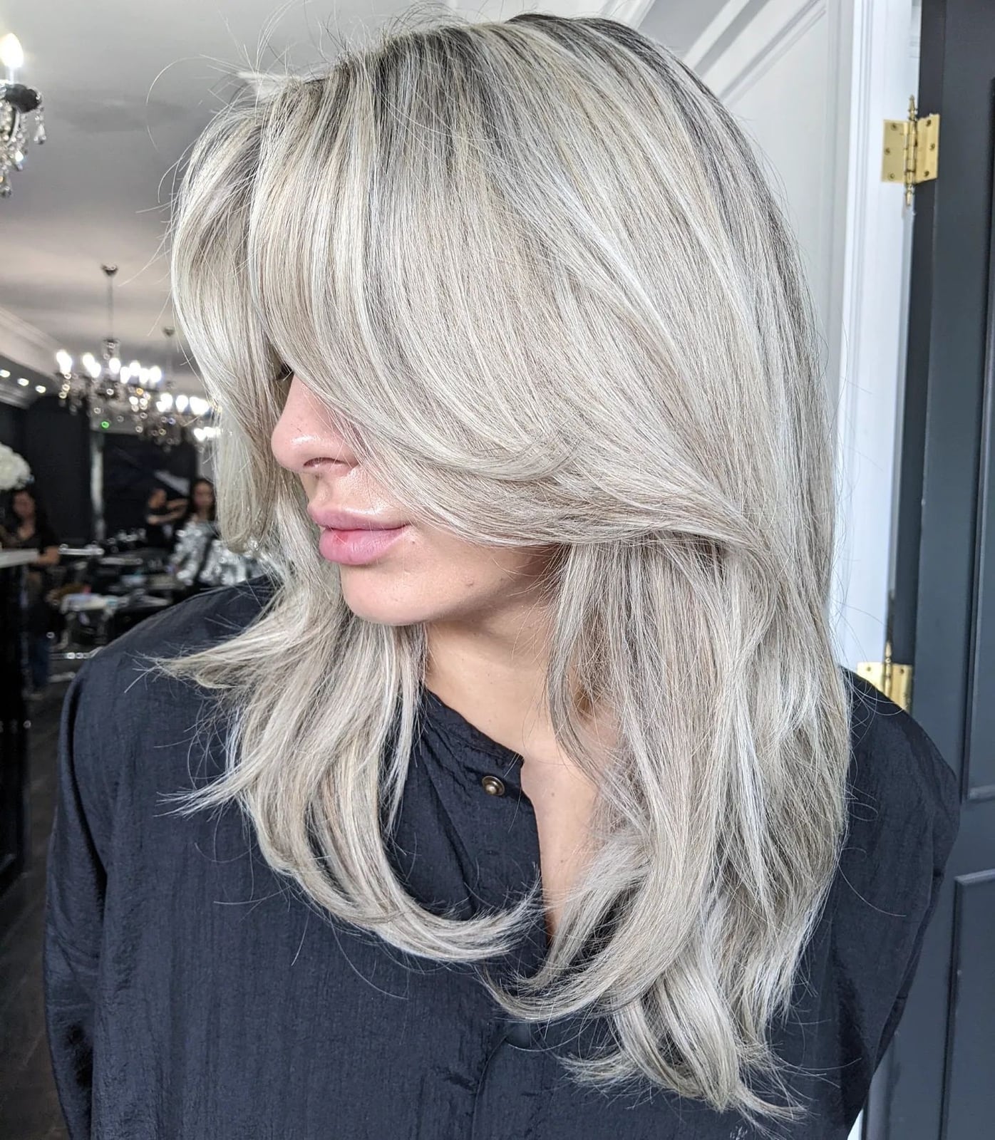 Collarbone Layers With Ash Blonde Highlights and Curtain Bangs Collarbone Layers With Ash Blonde Highlights and Curtain Bangs — Grey Highlights