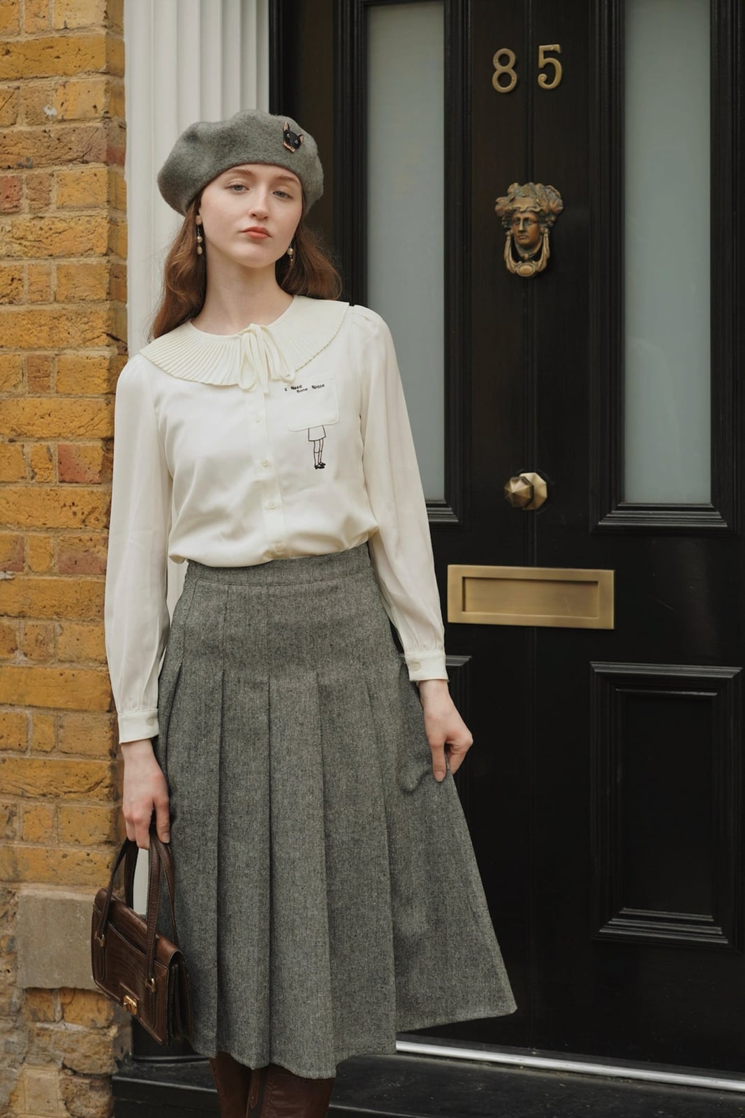 Gray Tweed Pleated Midi Skirt With White Blouse, Close-Up Take — Grey Skirt Outfit