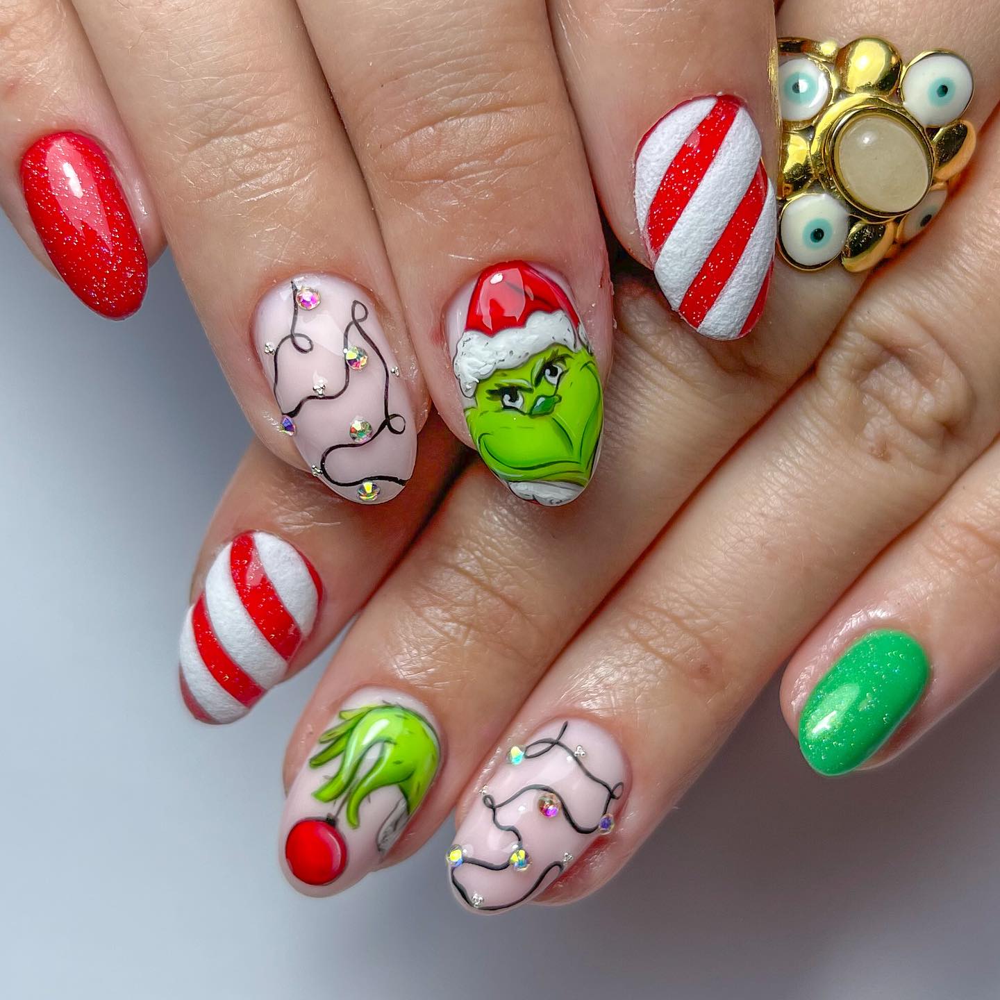 Grinch Holiday Nail Art with Candy Cane Stripes