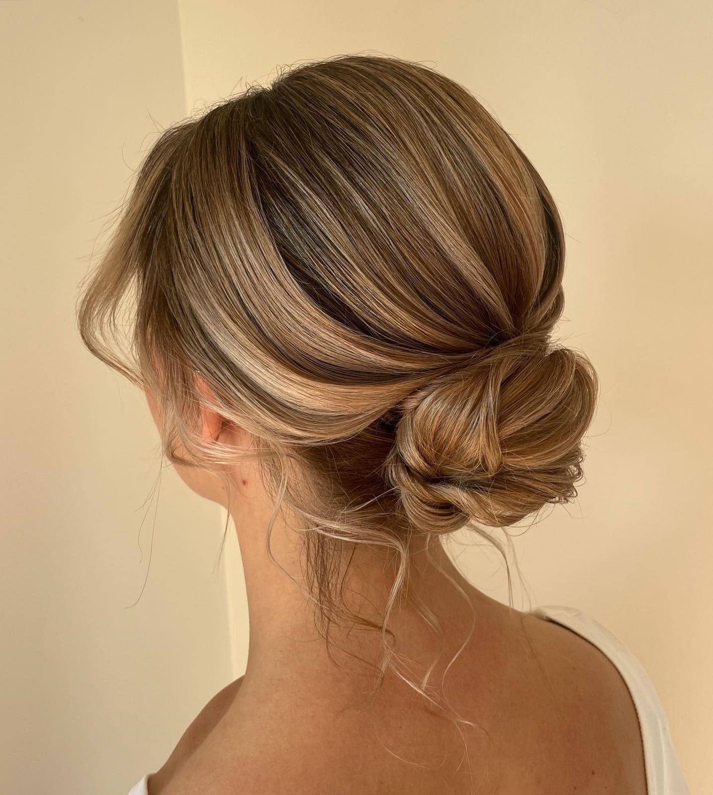 Twisted Low Bun With Wispy Pieces — Hair Up Hairstyles