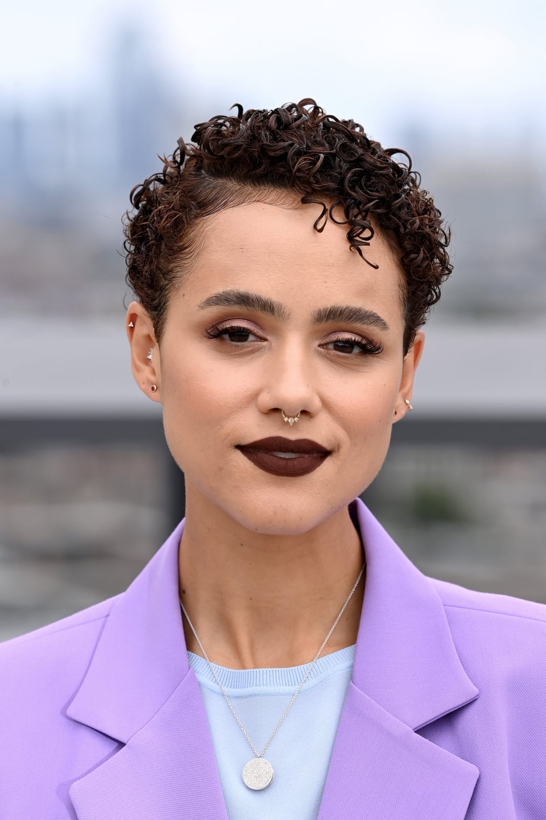 Textured Pixie Cut With Glossy Curls Textured Pixie Cut With Glossy Curls — Haircuts for Black Women