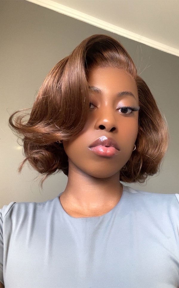 Voluminous Bob With Side-Swept Bangs Voluminous Bob With Side-Swept Bangs — Haircuts for Black Women