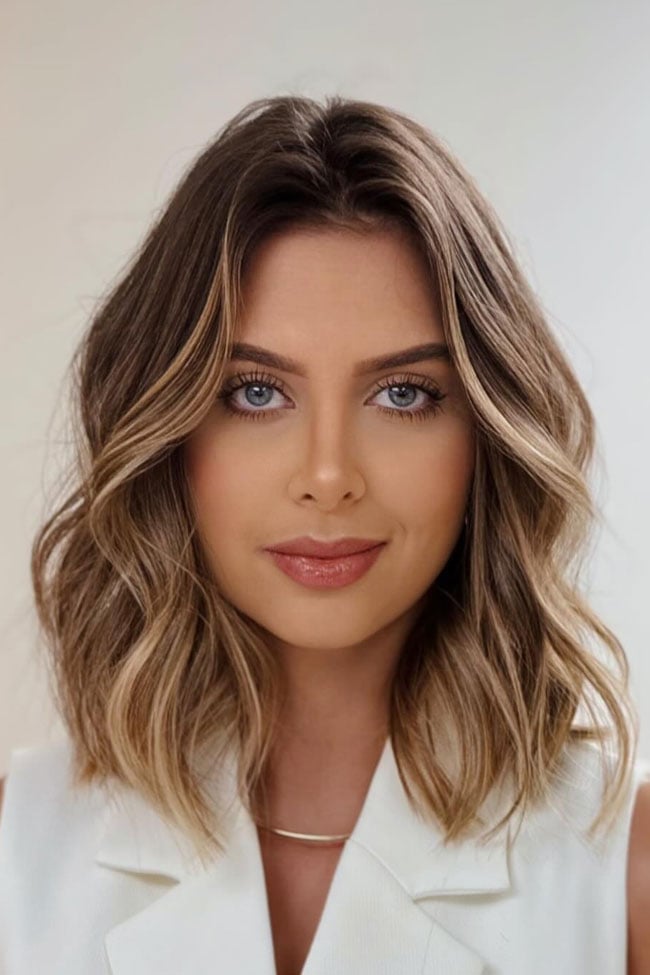 Shoulder Length With Blonde Highlights And Curtain Bangs Shoulder Length With Blonde Highlights And Curtain Bangs — Haircuts for Wavy Hair