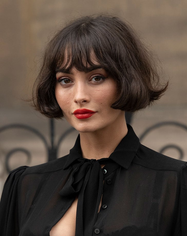 Chin Length Bob With Glossy Curtain Bangs Chin Length Bob With Glossy Curtain Bangs — Haircuts for Wavy Hair