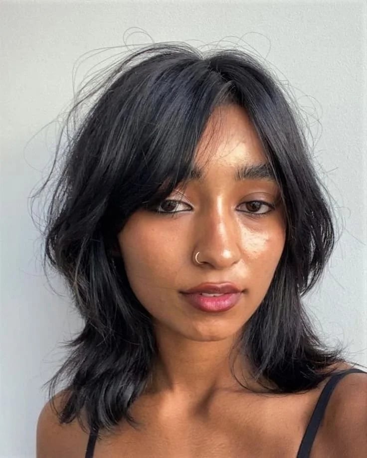 Mid-Back Shag With Wispy Bangs Mid-Back Shag With Wispy Bangs — Haircuts for Wavy Hair