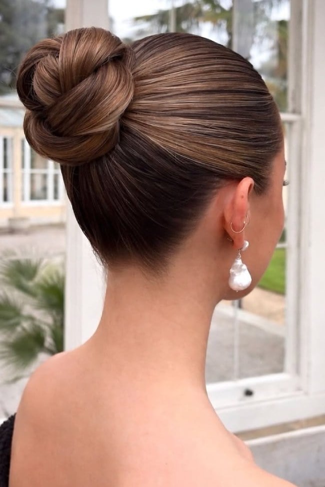 Sleek Dark Brown Twisted High Bun Sleek Dark Brown Twisted High Bun — High Bun Hairstyles