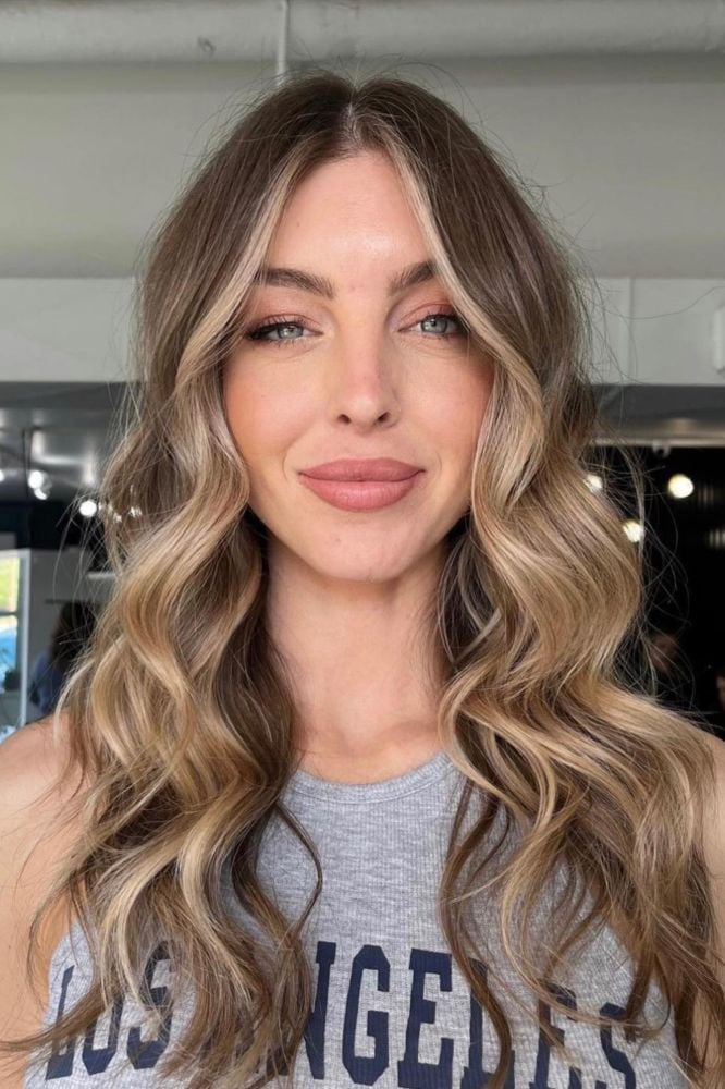 Blonde Highlights On Medium Brown Collarbone Lob With Curtain Bangs — Highlights Brown Hair