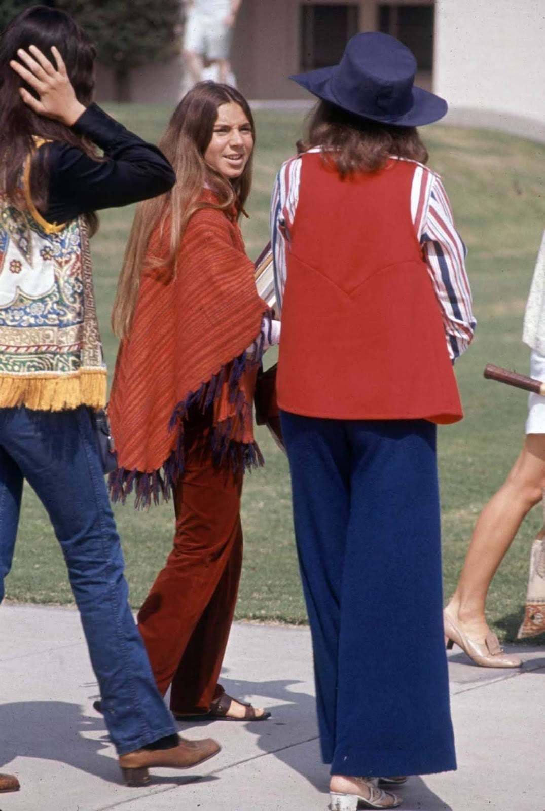 Red Sleeveless Vest Over Striped Shirt With Wide Leg Pants Red Sleeveless Vest Over Striped Shirt With Wide Leg Pants — Hippie Outfits