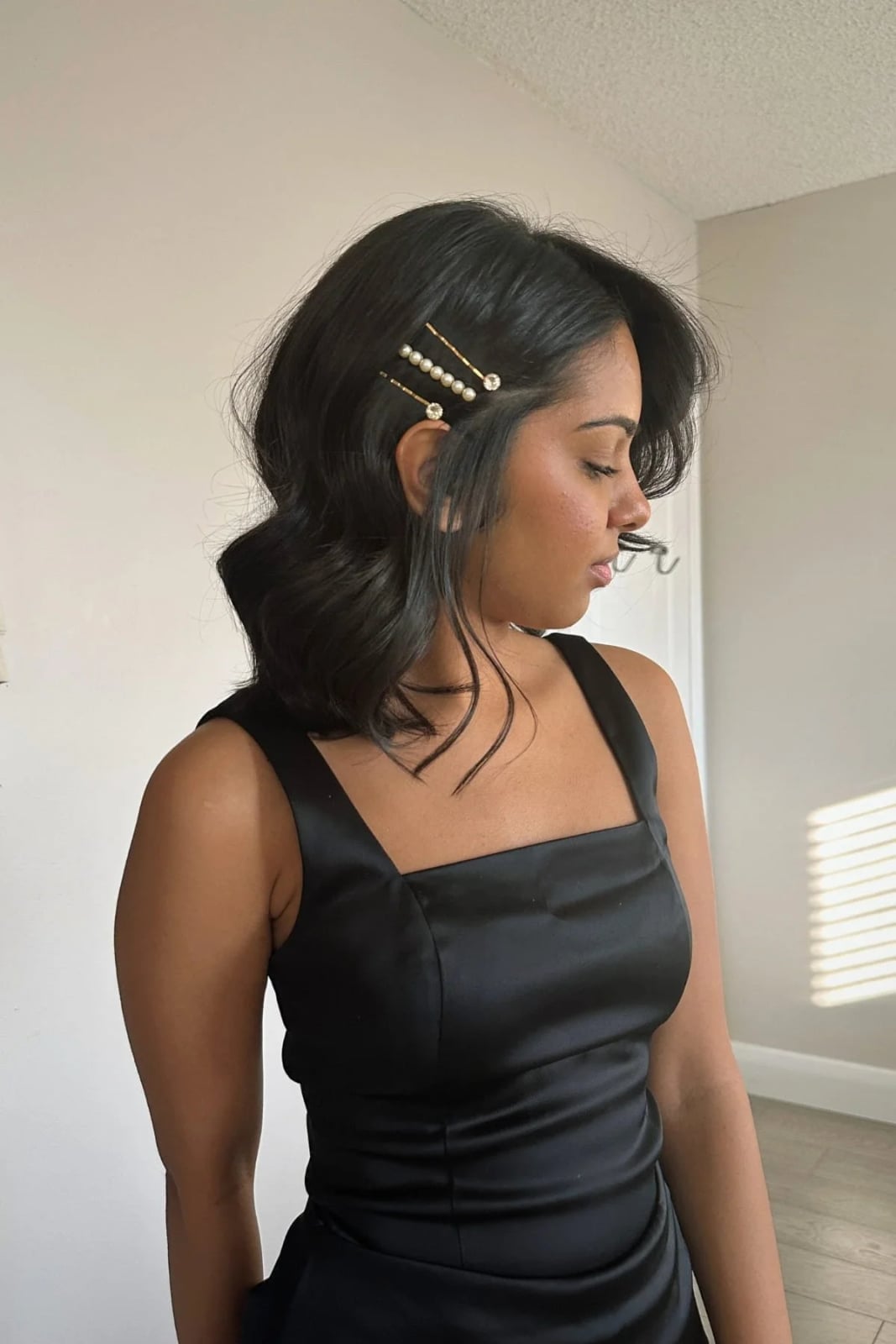 Wavy Chin Length Bob With Pins Wavy Chin Length Bob With Pins — Holiday Hairstyles