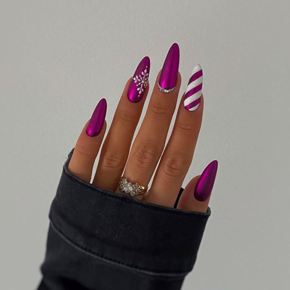 Long Stiletto Metallic Magenta Snowflake Nails Long Stiletto Metallic Magenta Snowflake Nails — Holiday Nail Designs