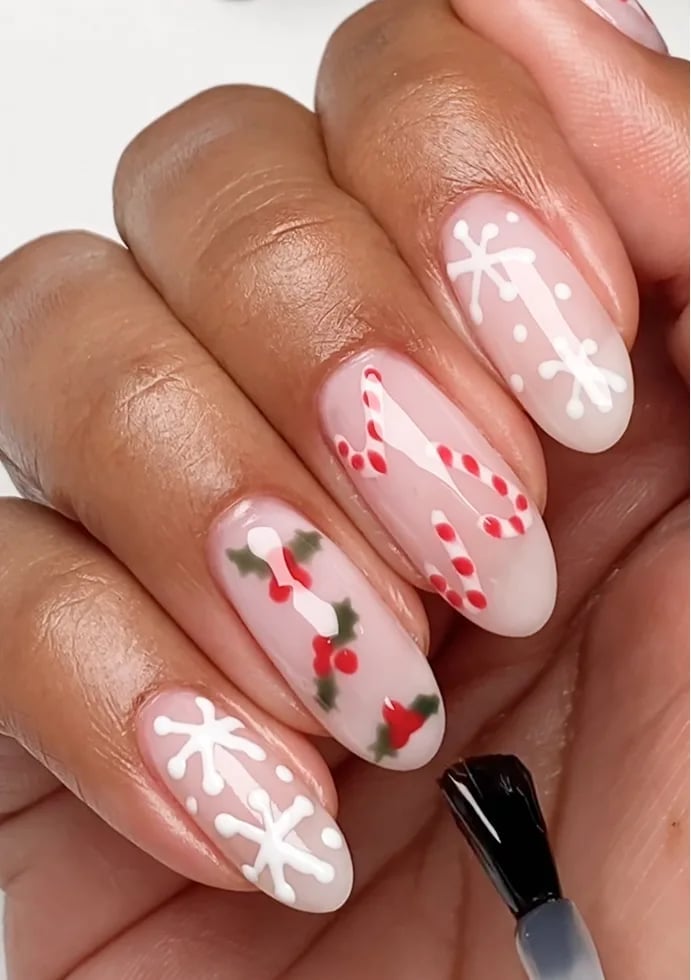 Medium Oval Snowflake Candy Cane Nails Medium Oval Snowflake Candy Cane Nails — Holiday Nail Designs