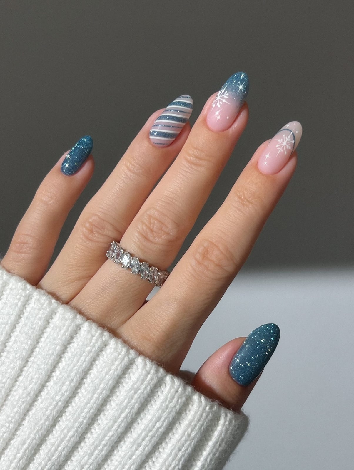Medium Almond Blue Glitter Snowflake Nails Medium Almond Blue Glitter Snowflake Nails — Holiday Nails