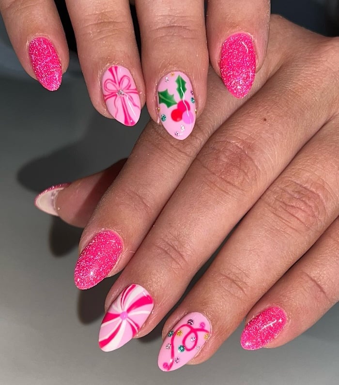Medium Almond Pink Glitter Bow Accent Nails Medium Almond Pink Glitter Bow Accent Nails — Holiday Nails