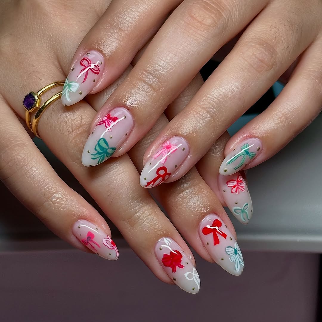 Medium Almond Mini Bow and Gold Dot Nails Medium Almond Mini Bow and Gold Dot Nails — Holiday Nails