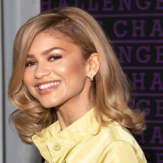 Shoulder Length Honey Blonde With Curtain Bangs and A Glossy Finish — Honey Blonde Hair
