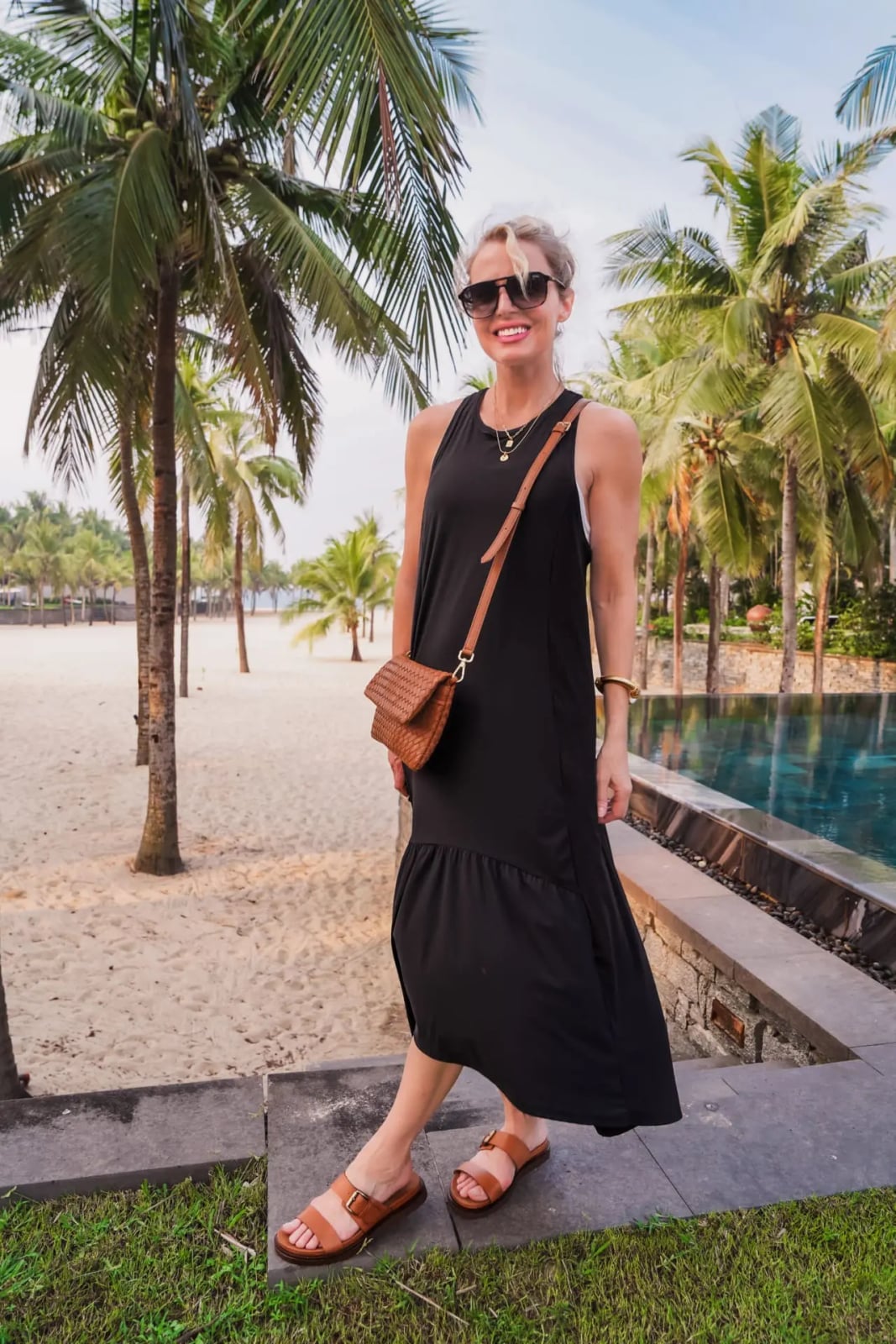 Black Sleeveless Maxi Dress with Woven Crossbody Bag — Hot Weather Outfits