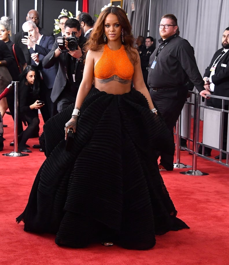 Orange Halter Crop Top with Black Pleated Skirt Orange Halter Crop Top with Black Pleated Skirt — Iconic Dresses