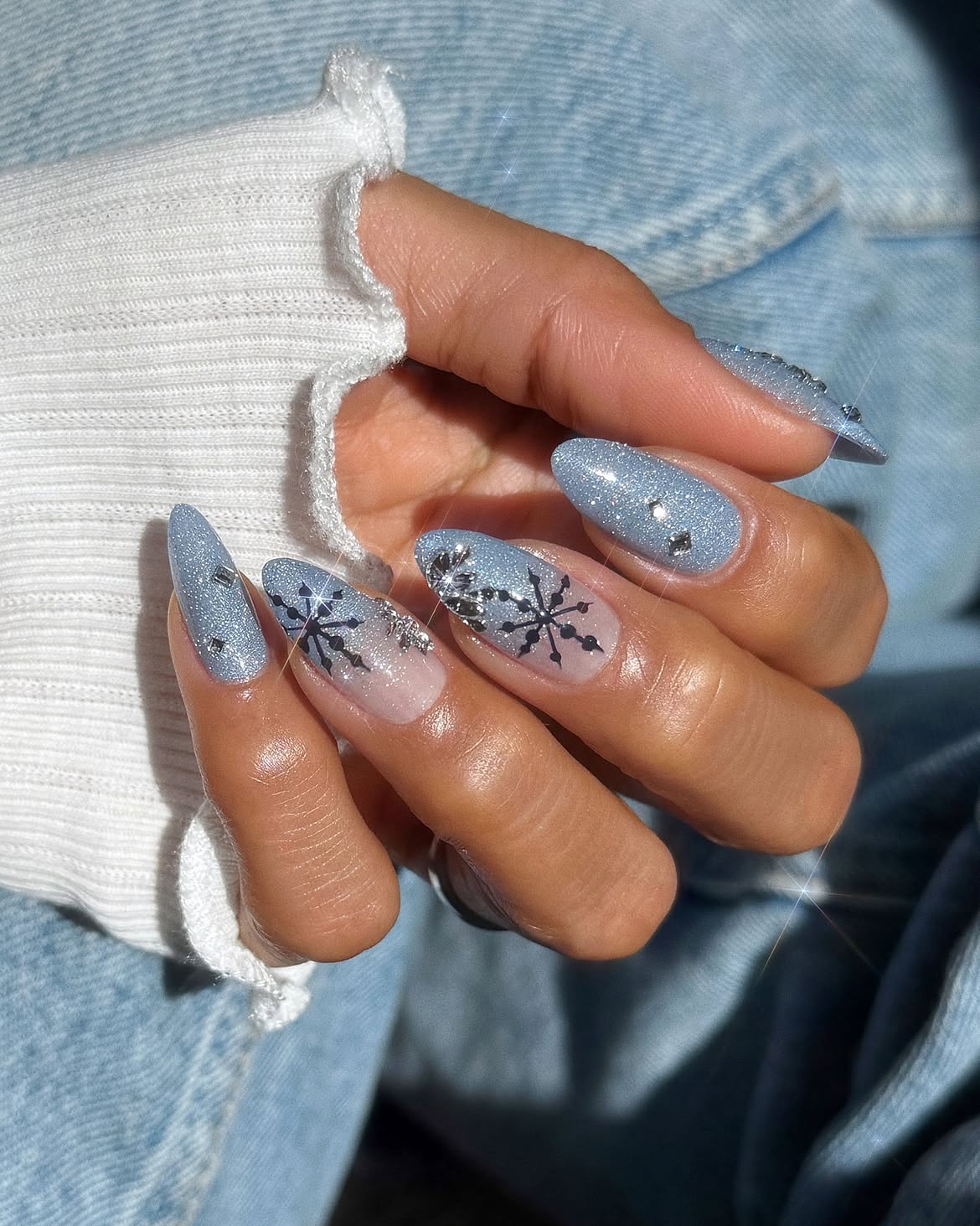 Icy Blue Shimmer Almond Nails with Snowflakes