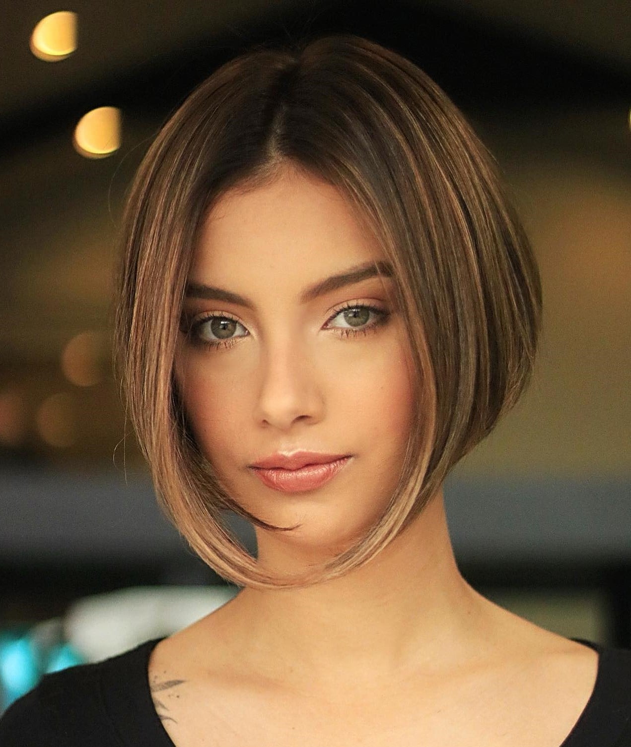 Dark Brown Inverted Bob With Side Swept Bangs Dark Brown Inverted Bob With Side Swept Bangs