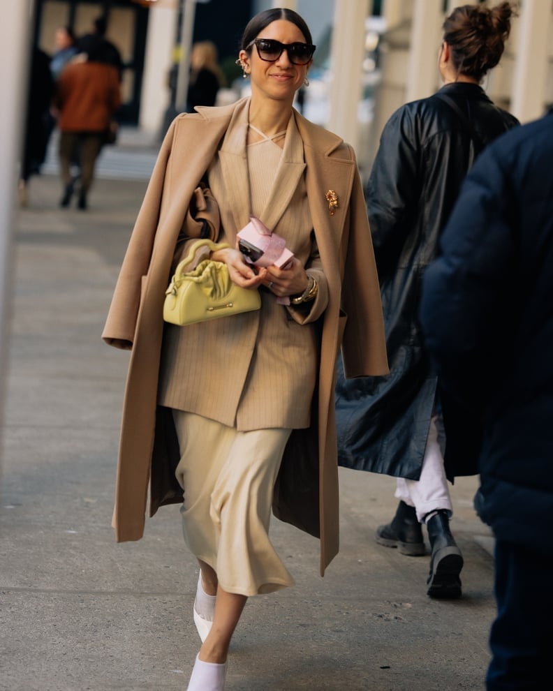 Camel Coat Over Pinstripe Suit Jacket with Midi Skirt — Job Interview Outfits