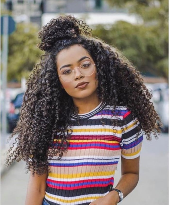 Mid-Back Layers With Curtain Bangs And Top Knot — Kinky Hair