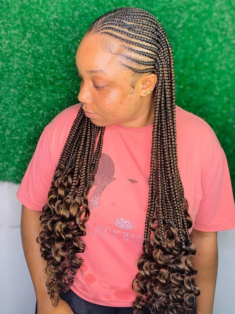 Mid-Back Knotless Braids With Brown Highlights And Wavy Ends